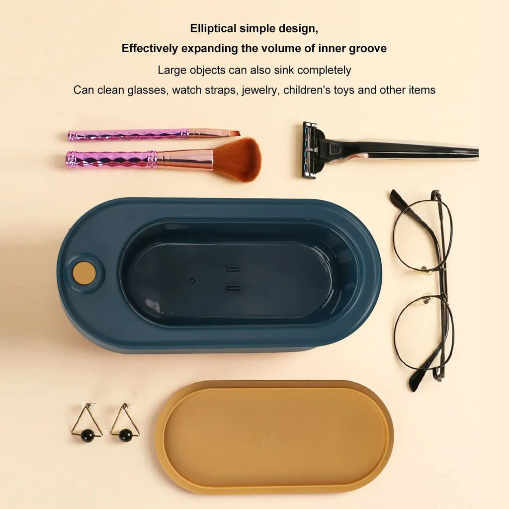 Two oval trays, one blue and one gold, with various items on a beige background.