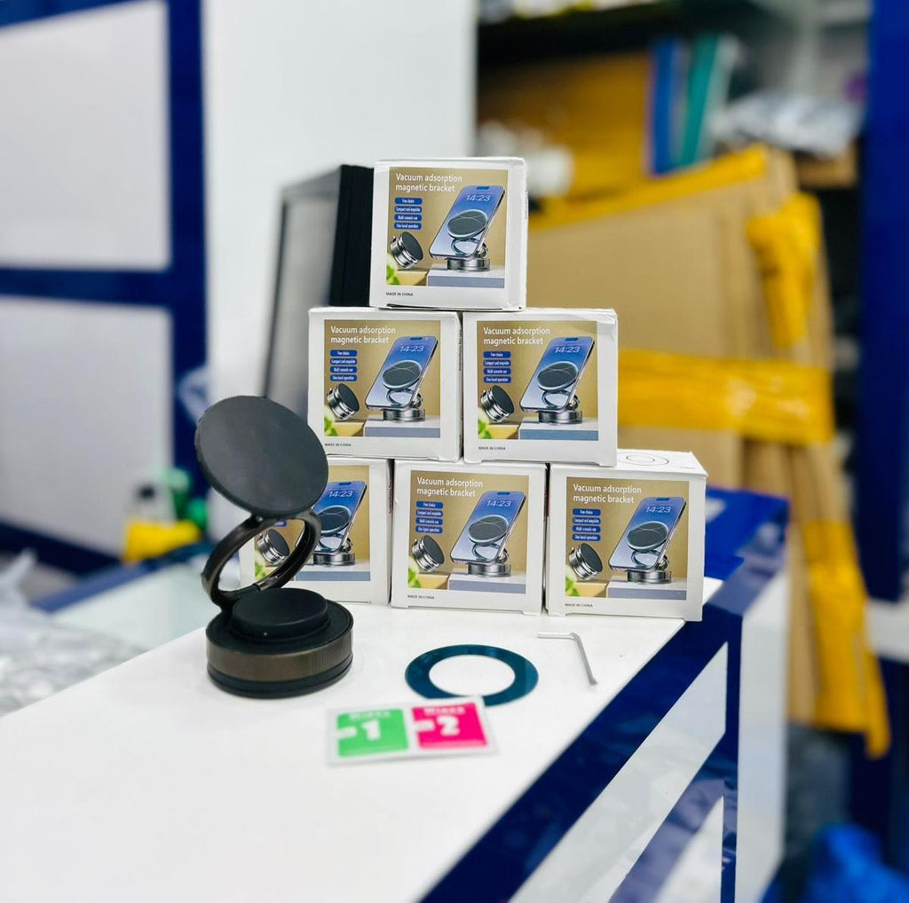 Stack of product boxes on a table with a blurred background