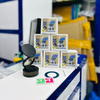 Stack of product boxes on a table with a blurred background